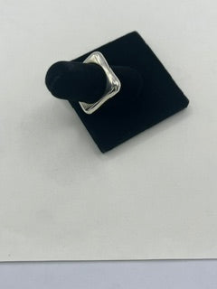 Round hole in a Square Ring