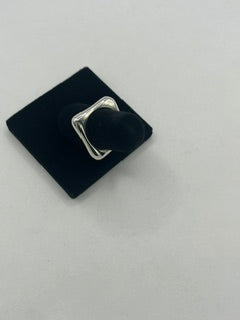 Round hole in a Square Ring